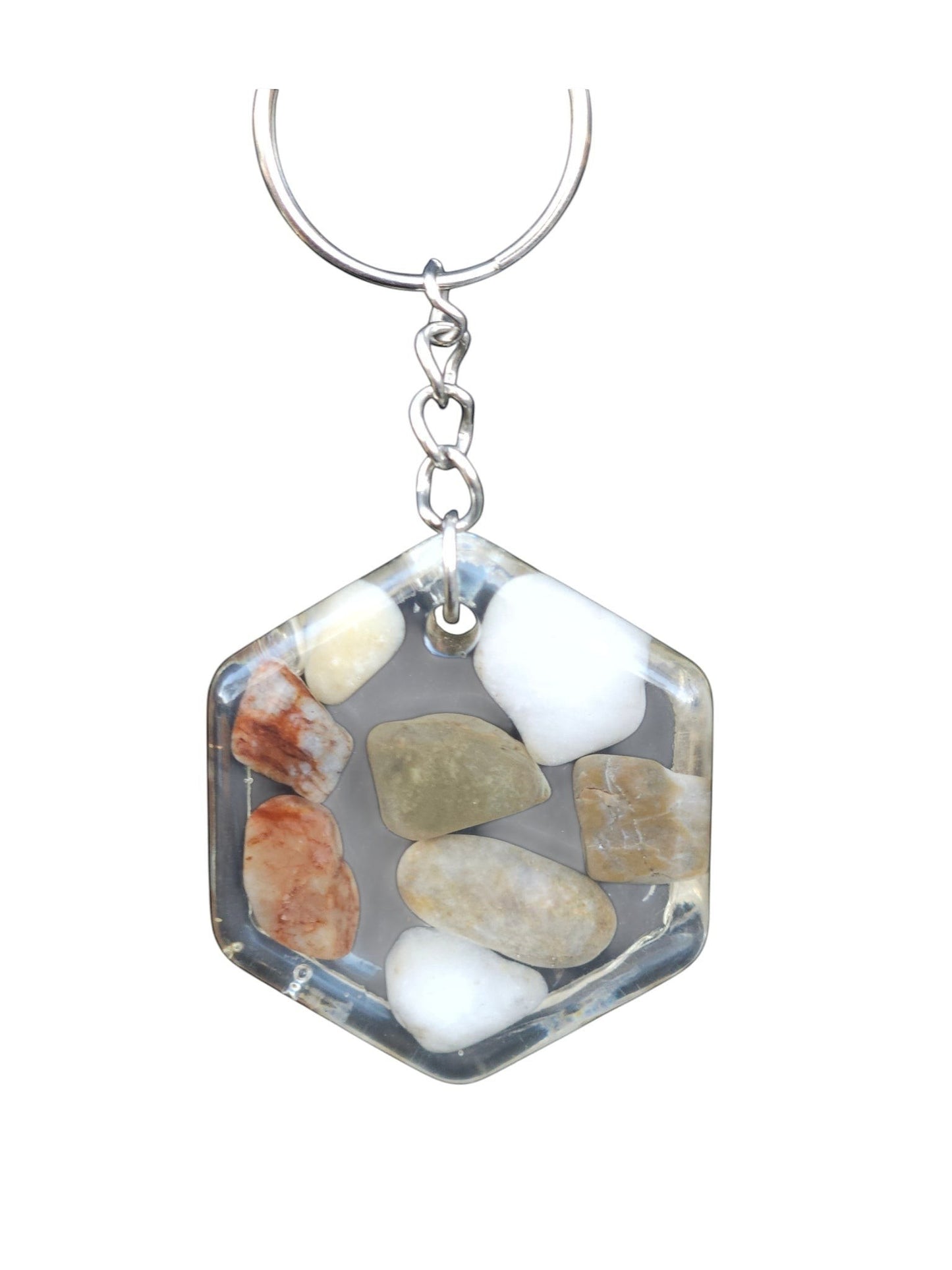 Nature's Stash handmade hexagonal resin keyring featuring polished multi-colored gemstones and petrified wood.