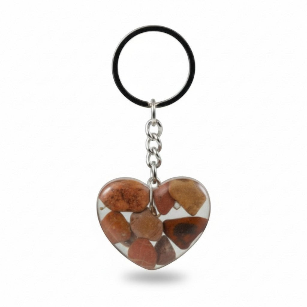 Nature's Stash heart-shaped resin keyring featuring hand-polished brown and red gemstones on a metal split ring.
