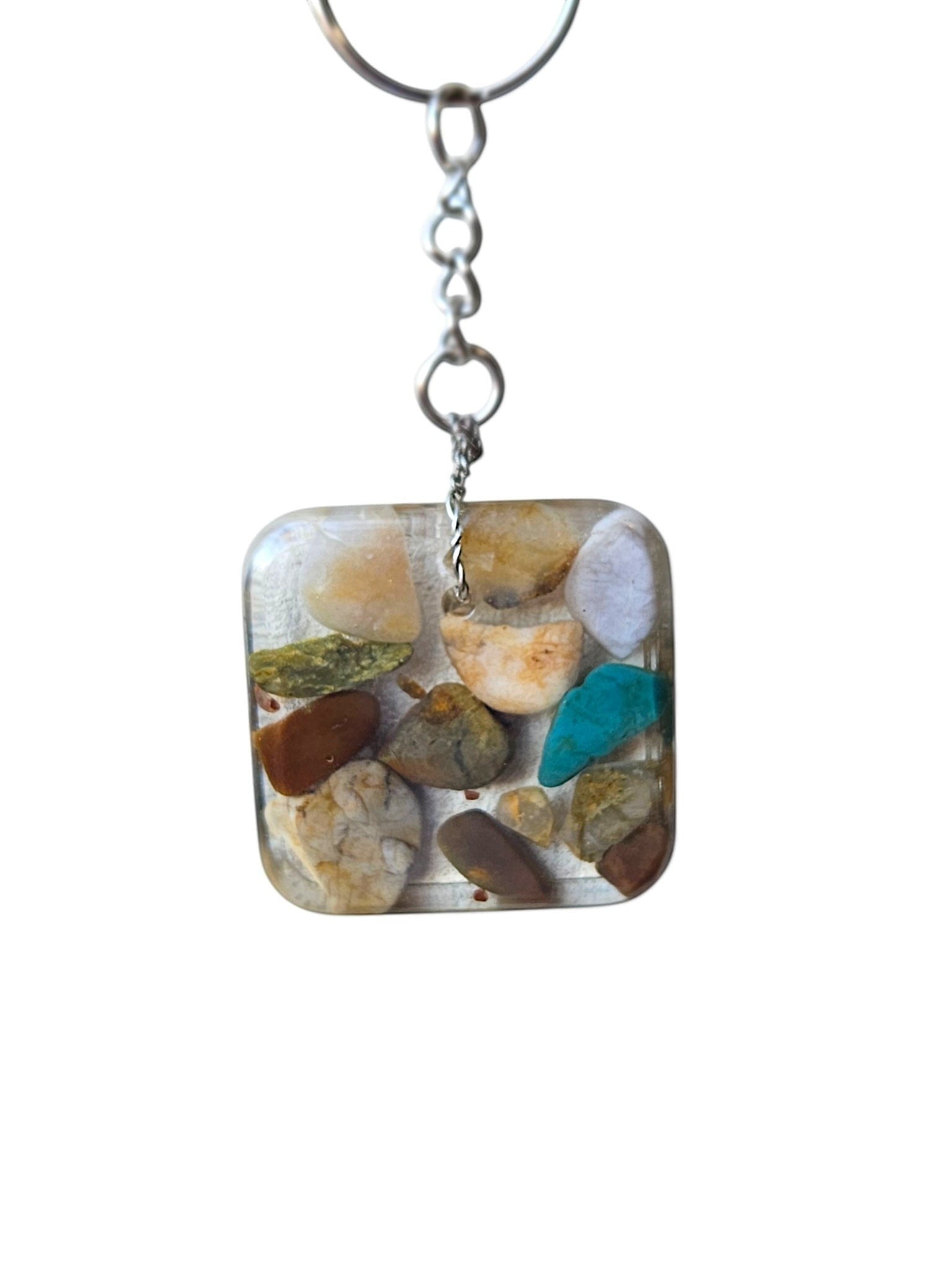 Nature's Stash square resin keyring featuring embedded hand-polished natural gemstones and petrified wood.