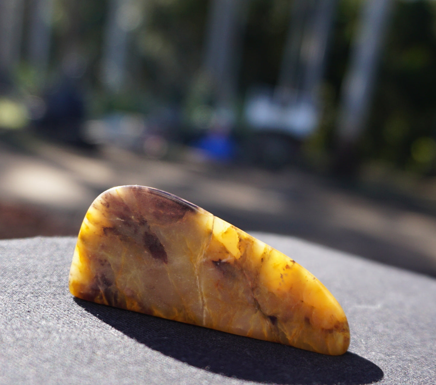 Hand-cut and polished Bucca Jasper freeform with gold, burgundy and purple tones, one-of-a-kind Australian stone