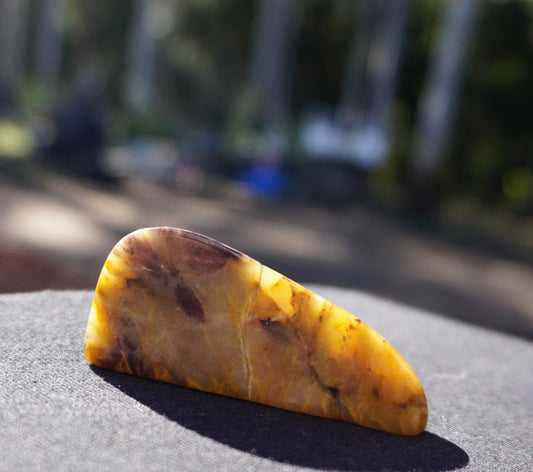Hand-cut and polished Bucca Jasper freeform with gold, burgundy and purple tones, one-of-a-kind Australian stone