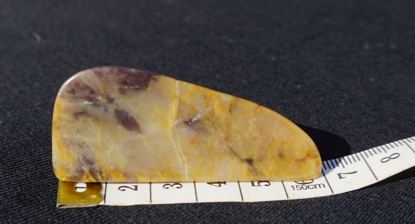 Hand-cut and polished Bucca Jasper freeform with gold, burgundy and purple tones, one-of-a-kind Australian stone