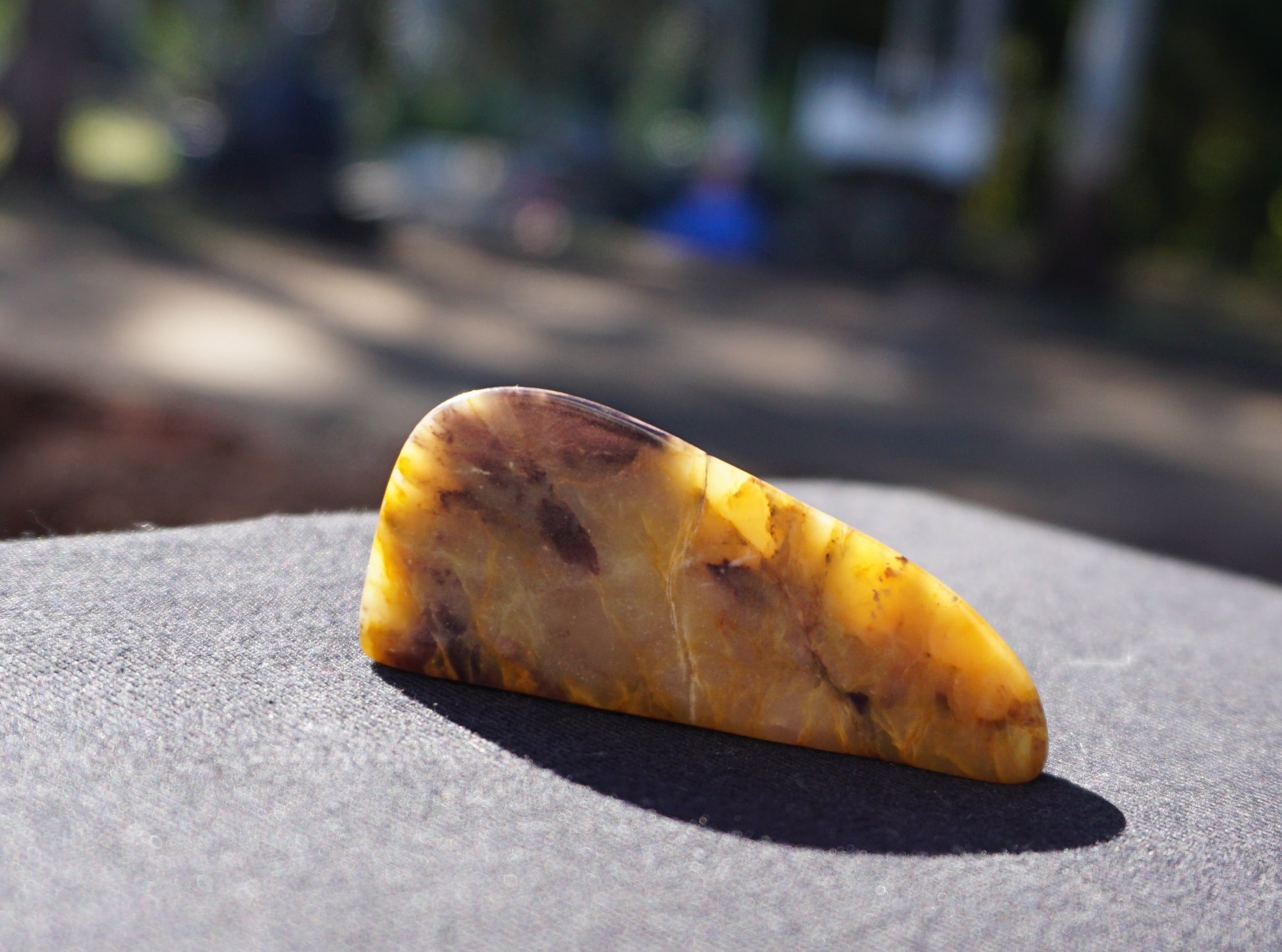 Hand-cut and polished Bucca Jasper freeform with gold, burgundy and purple tones, one-of-a-kind Australian stone