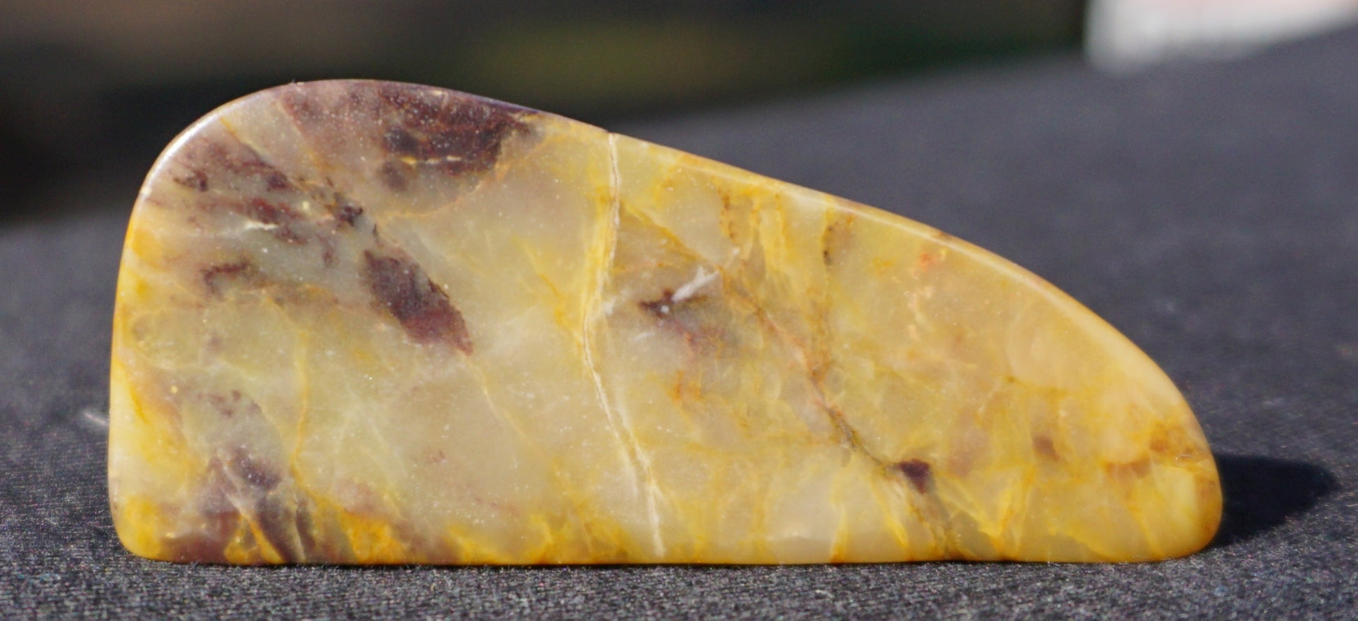 Hand-cut and polished Bucca Jasper freeform with gold, burgundy and purple tones, one-of-a-kind Australian stone