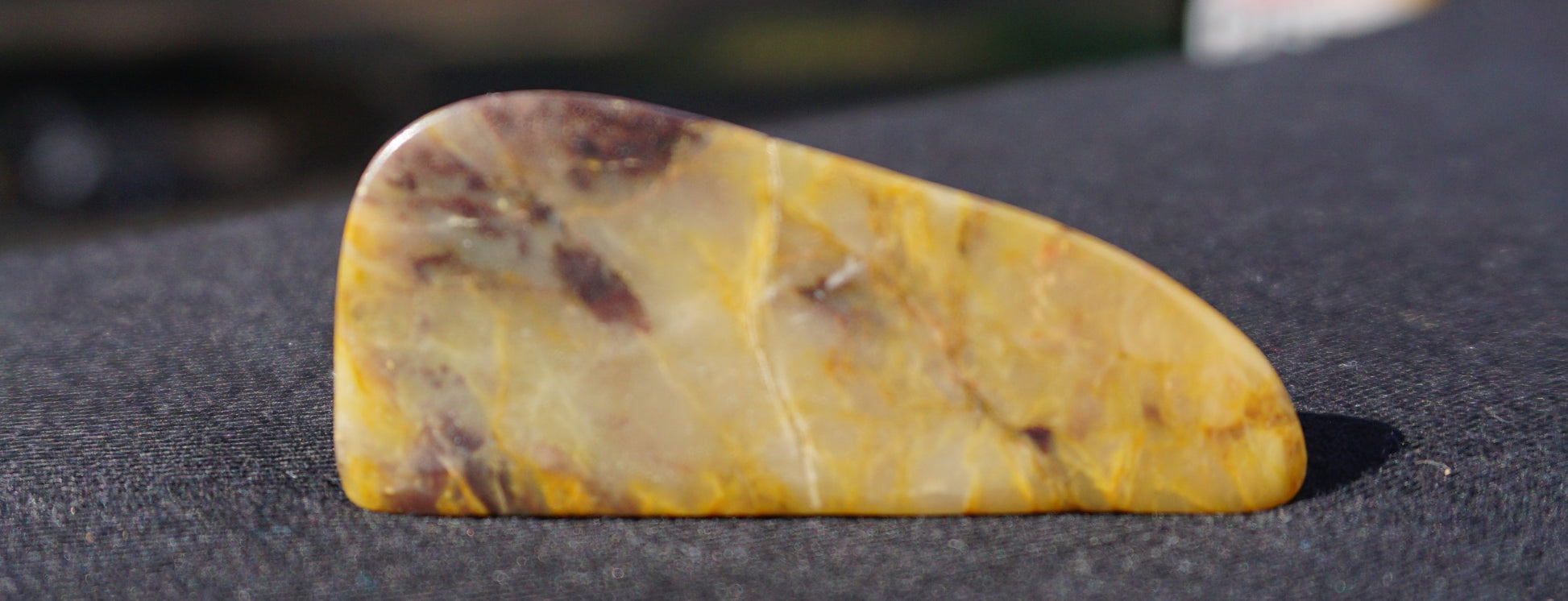 Hand-cut and polished Bucca Jasper freeform with gold, burgundy and purple tones, one-of-a-kind Australian stone