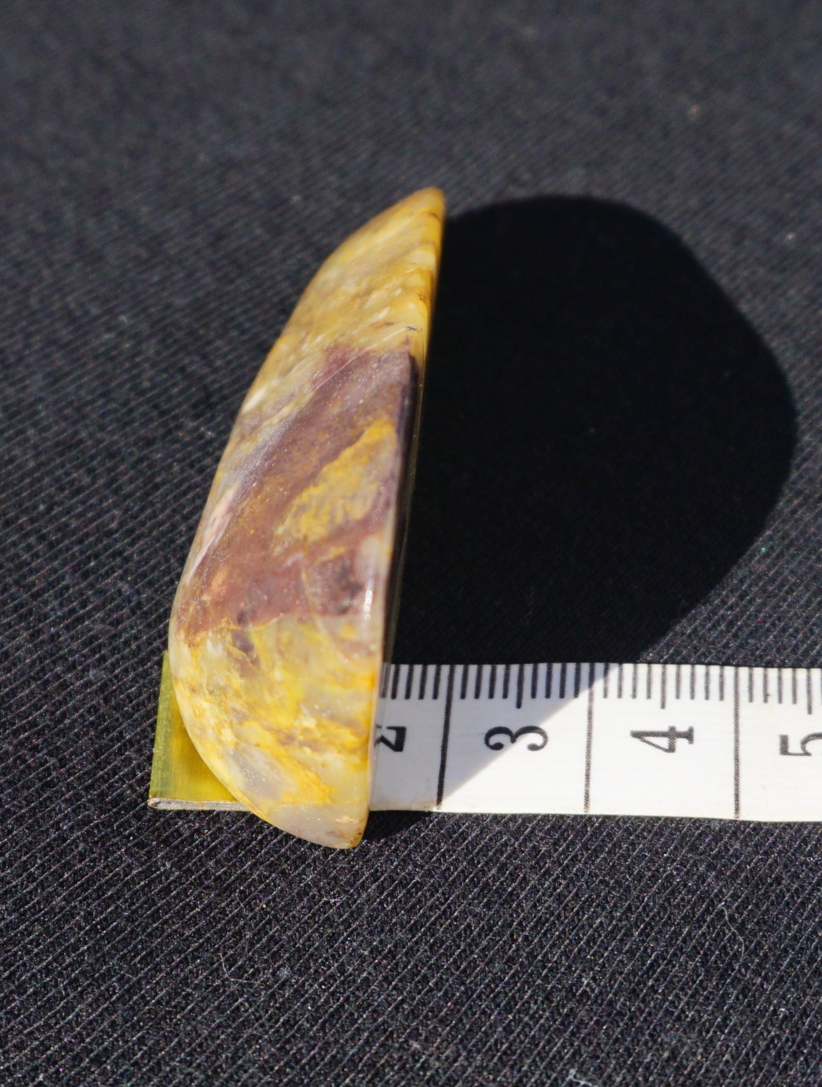 Hand-cut and polished Bucca Jasper freeform with gold, burgundy and purple tones, one-of-a-kind Australian stone