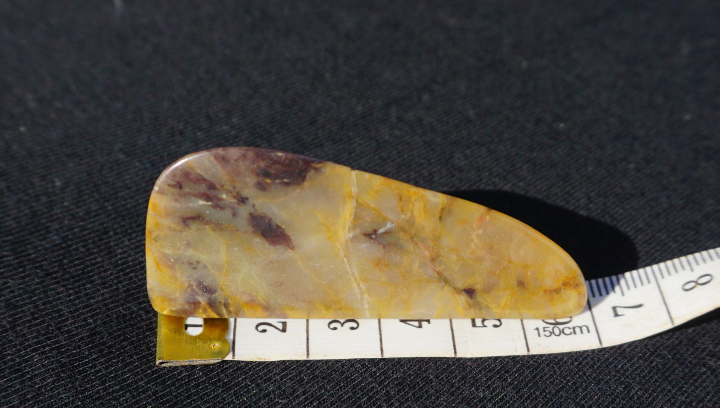 Hand-cut and polished Bucca Jasper freeform with gold, burgundy and purple tones, one-of-a-kind Australian stone